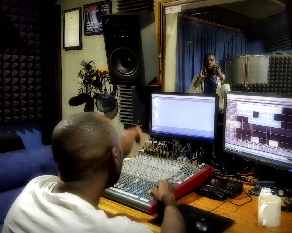 Peles producing vocal dubs.